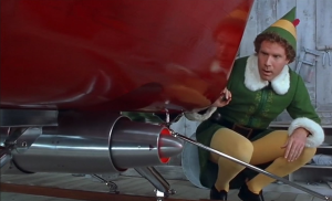 Buddy the elf checks out the Kringle 3000 on Santa's sleigh