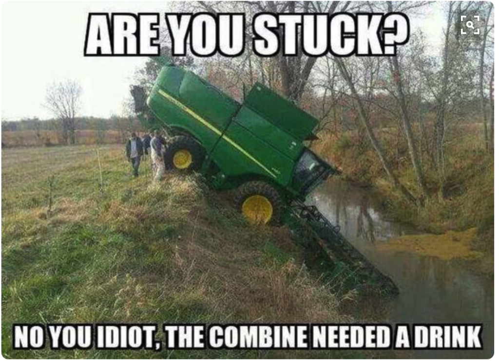 Combine Stuck in Ditch